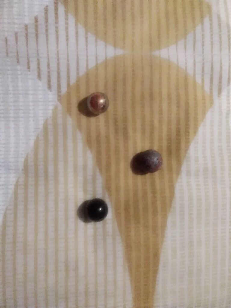 12 very collectible marbles and pouch few rare ones