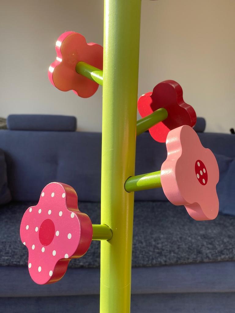 Beautiful coat / clothes stand in pink and green 