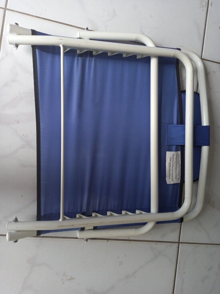 Adjustable back rest with multiple uses
