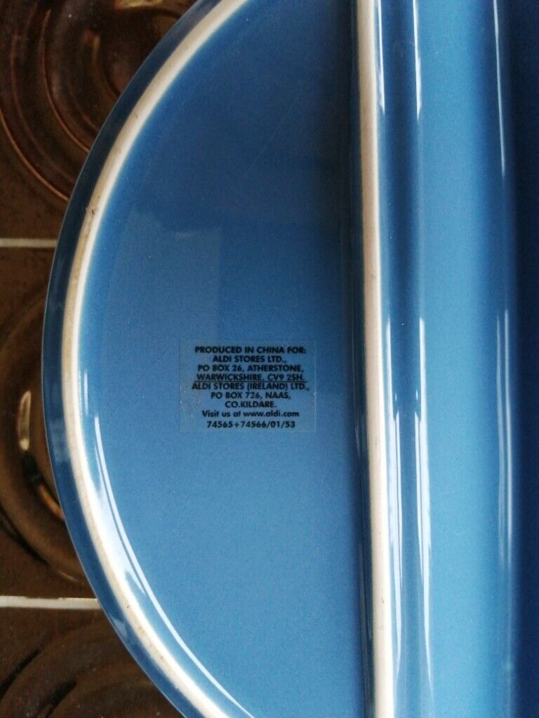 Two matching round oven dishes 
