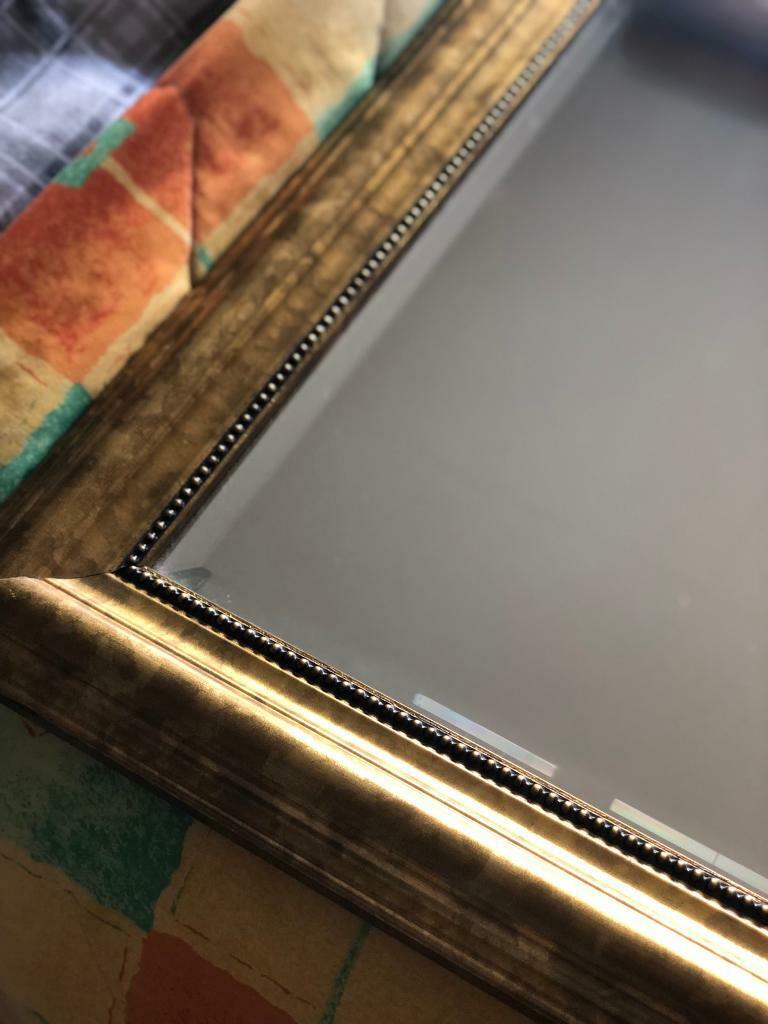 Mirror on heavy golden framed 140,5x 50,5 in cm