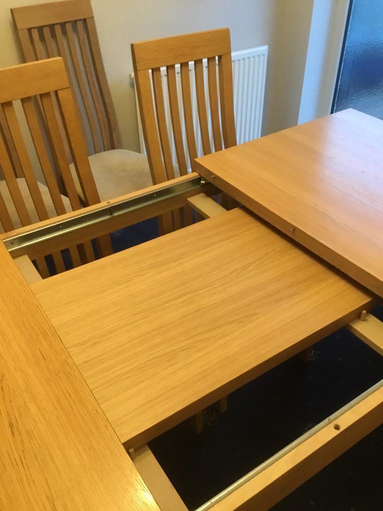 Extendible table and chairs