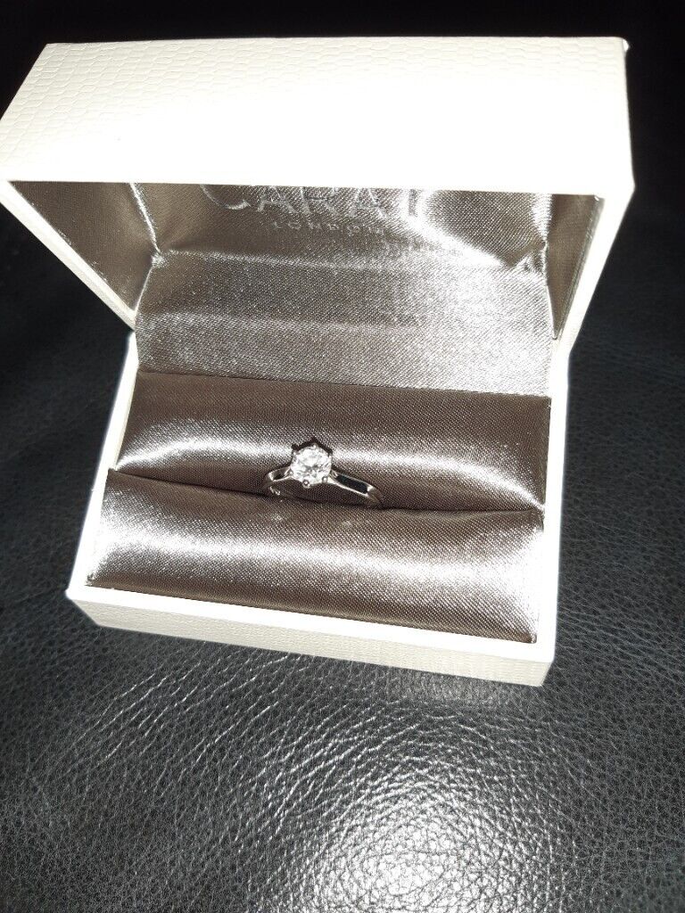 Premier Round Brilliant Trilogy Ring