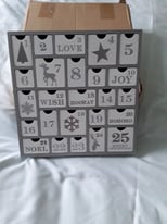 WOODEN ADVENT CALENDAR WITH 25 DRAWERS OF VARIOUS SIZES