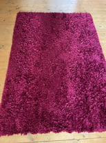 Wine Colour Shaggy style Rug see photo for size, cost approx £85 new