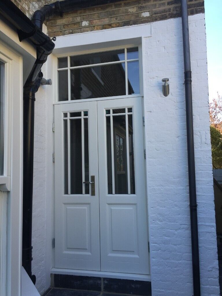 Traditional wooden sash window with key