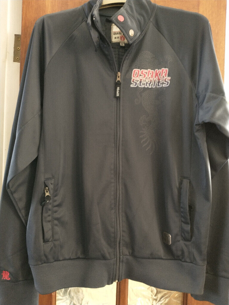 image for JACKET. XL. ZIPPED, SPORTS-STYLE. CHARCOAL GREY, 'OSAKA SERIES' Logo. As new cond.