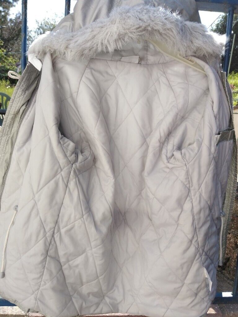 Bargain Coat Age c. 10. Silver (reflects); fur-edge hood; pockets galore!