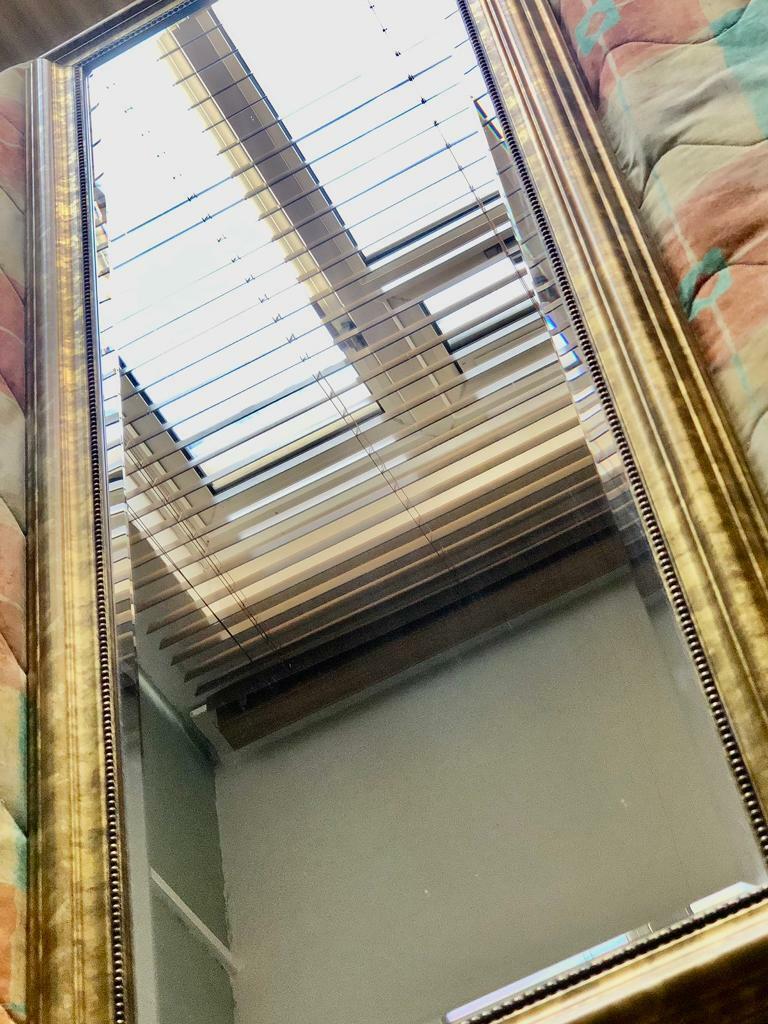 Mirror on heavy golden framed 140,5x 50,5 in cm