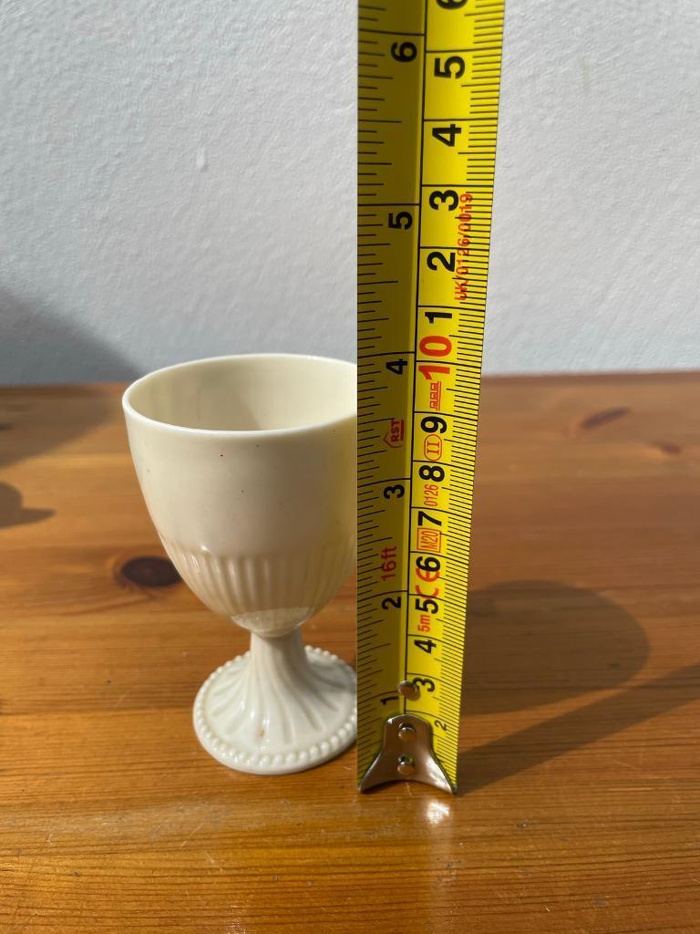 Porcelain egg cup holder 