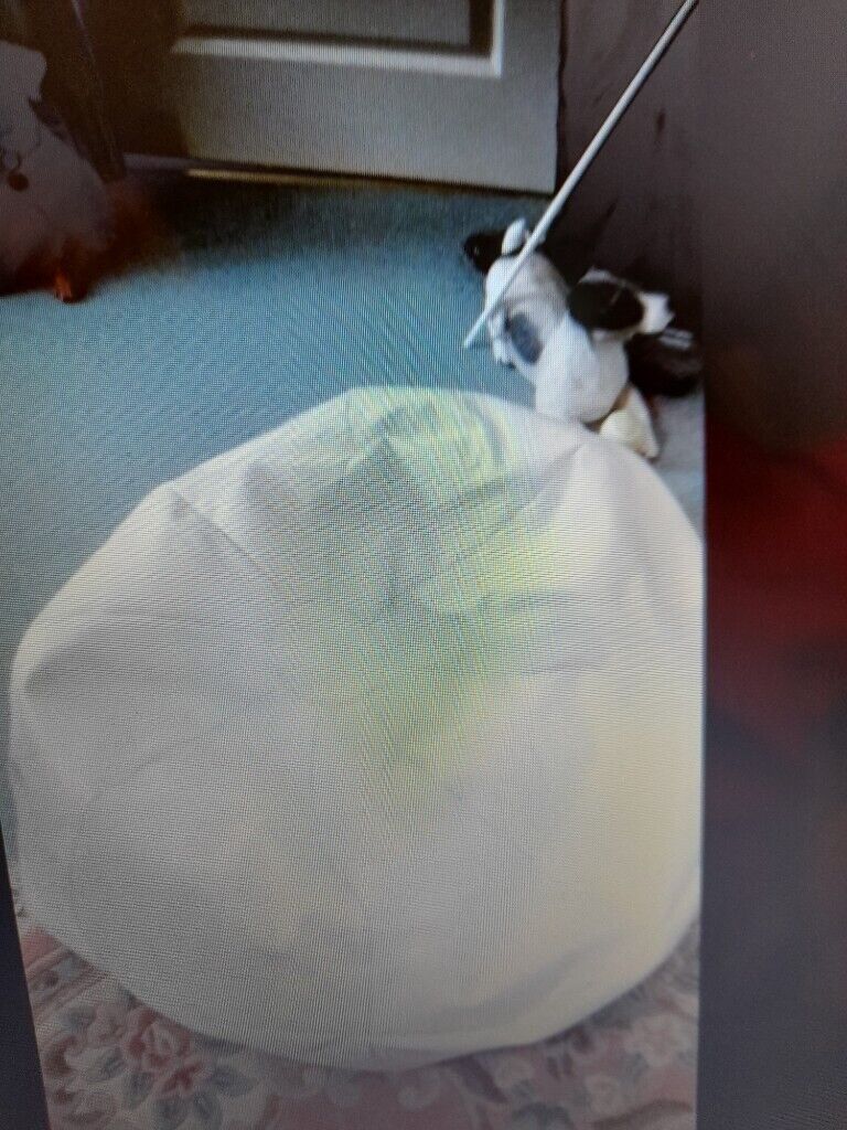 A Large White Football Bean Bag Pouffe