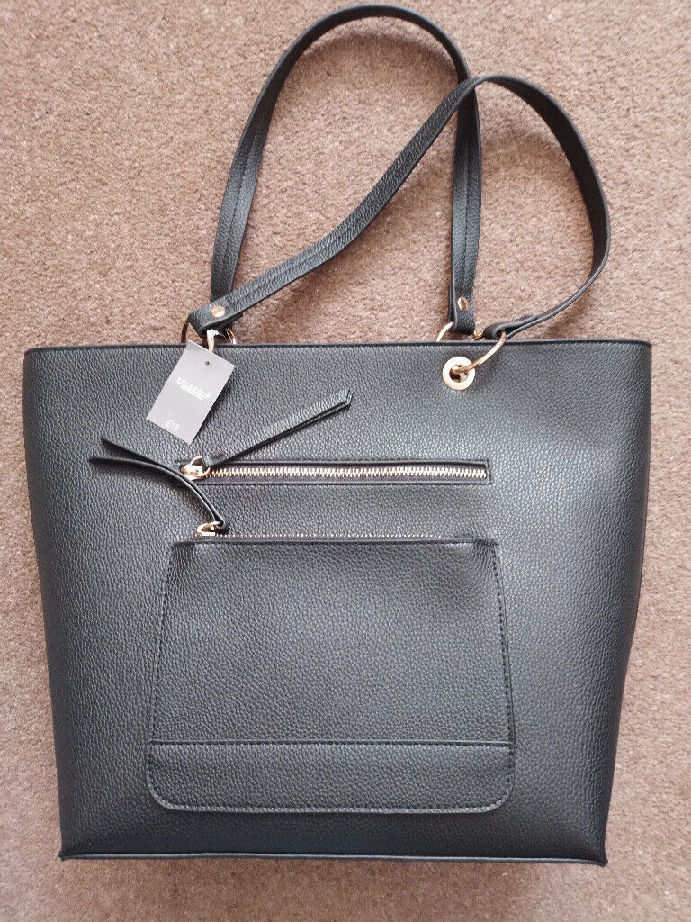 image for  SHOPPING BAG. BLACK FAUX LEATHER. NEW, STILL TAGGED.