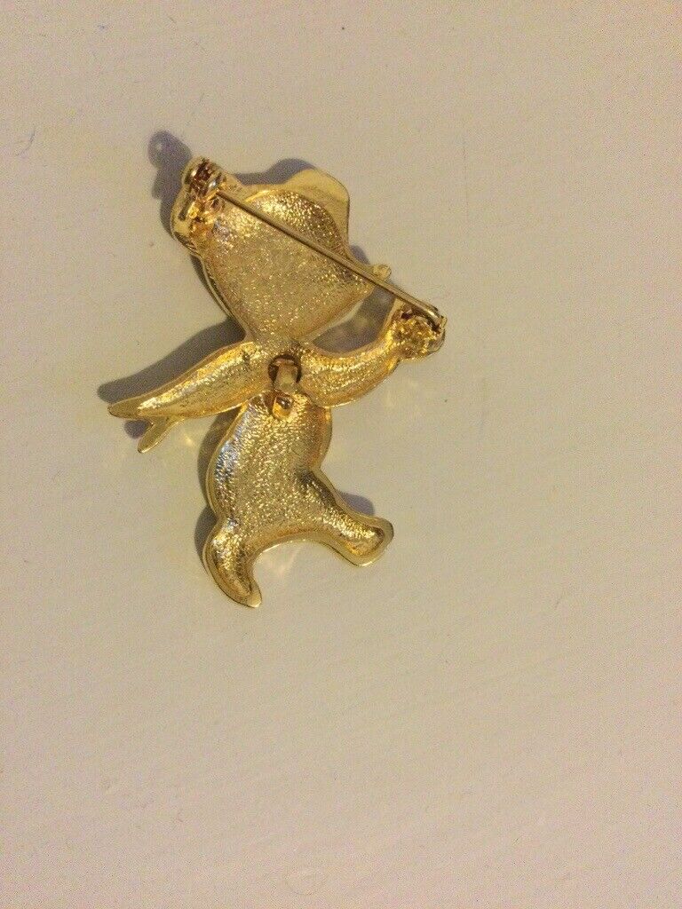Vintage brooch articulated teddy bear