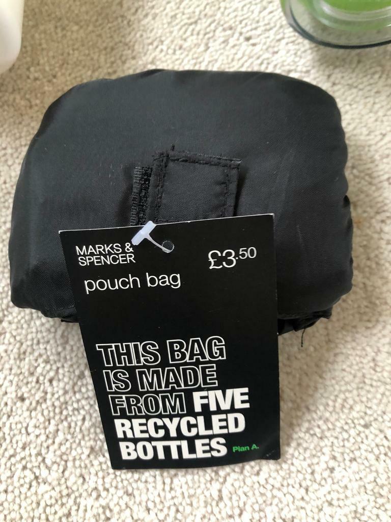 A Smart Travel Mug, White water bottle, Marks & Spencer pouch bag.
