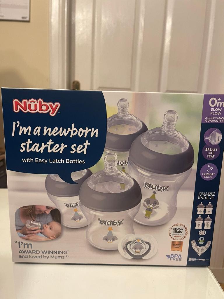 New in box, unopened Nuby Natural Touch newborn starter set