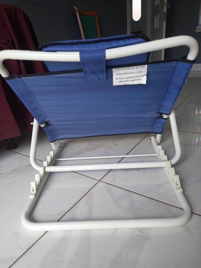 Adjustable back rest with multiple uses