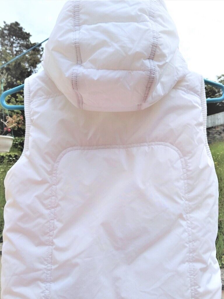 image for White Padded Gilet with Hood. Clean, cute & trendy for girl c. 8/9 yrs
