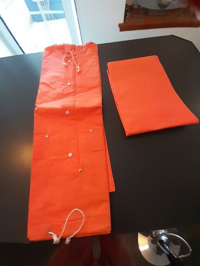 NEW,UNUSED 2 piece HEAVY DUTY waterproof SLICKER SUIT, size SMALL