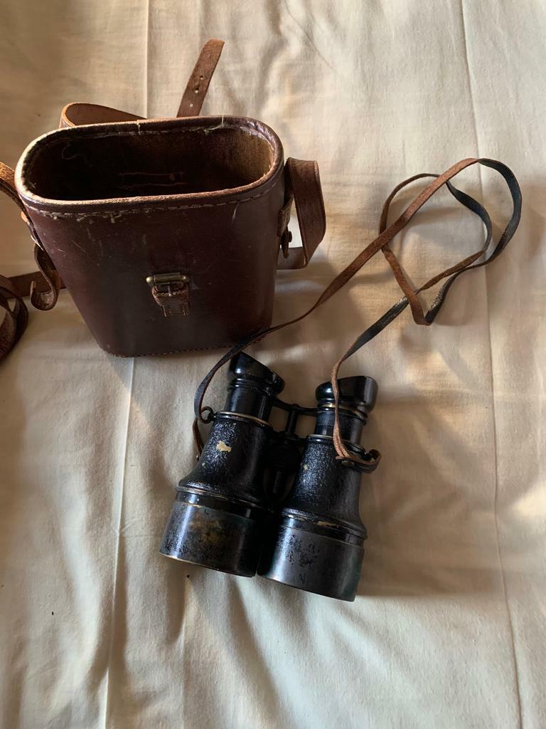 Binoculars and original leather case. £30