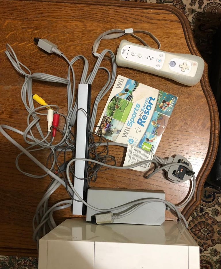 Nintendo Wii bundles with 1 sports game ,headphone,balance board,ect