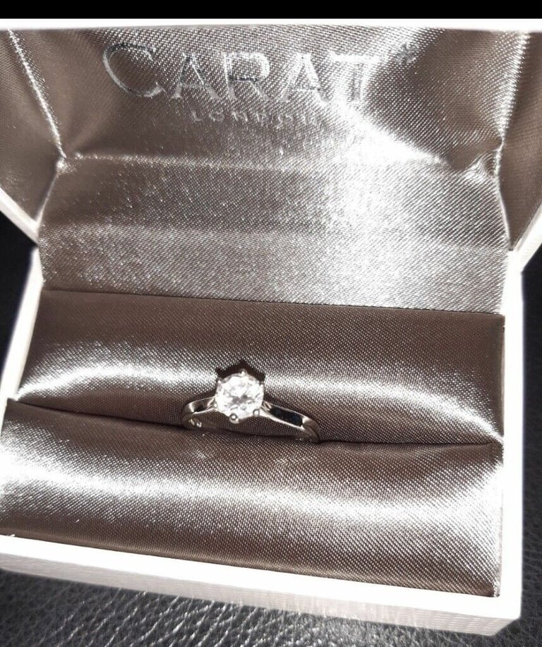 Premier Round Brilliant Trilogy Ring