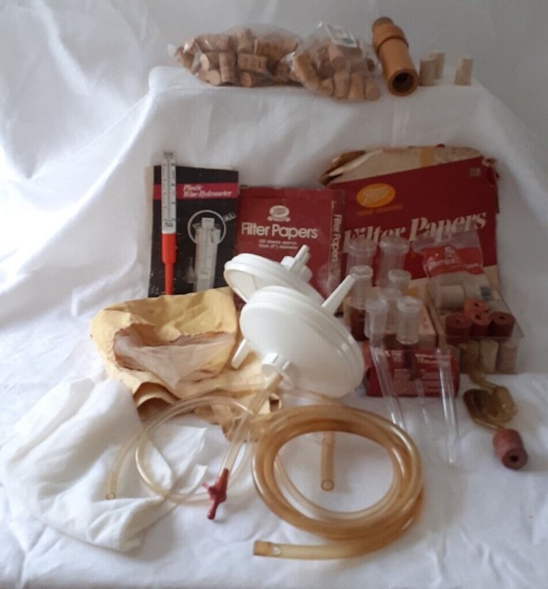 Wine Making equipment with corking tool and books