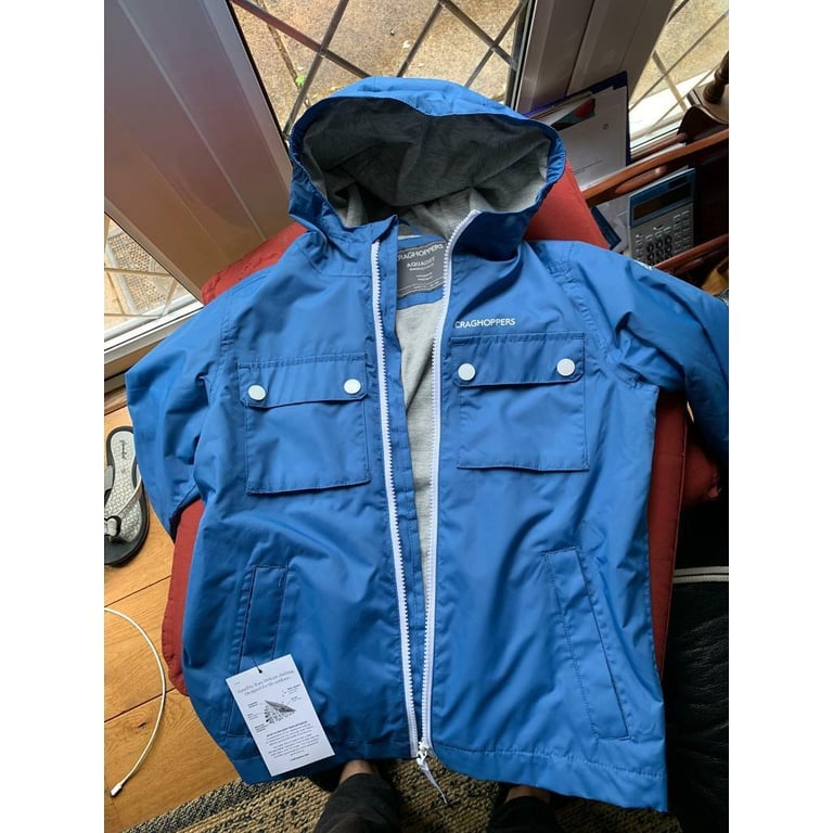 image for Brand new with tags light coat , size 128