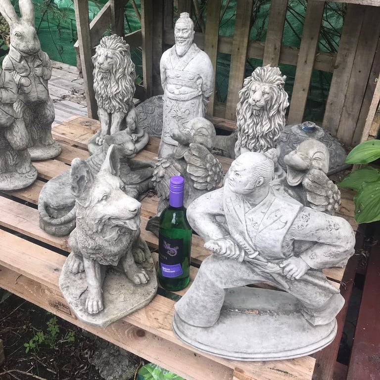 Sleeping puppy garden statue