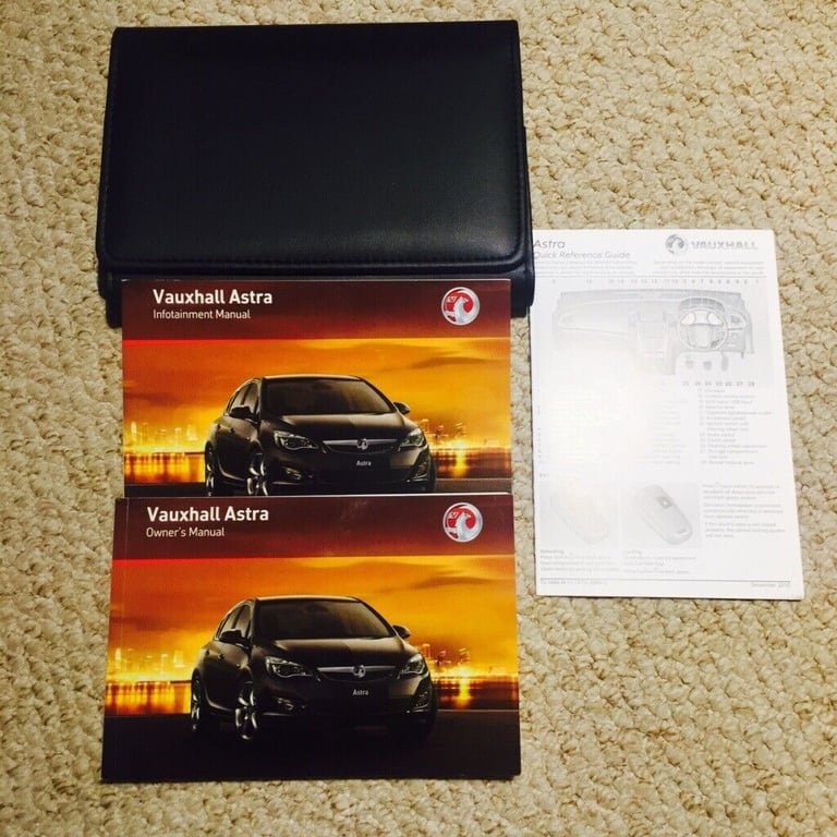 Vauxhall Astra 2011 handbook/manual/leather wallet 
