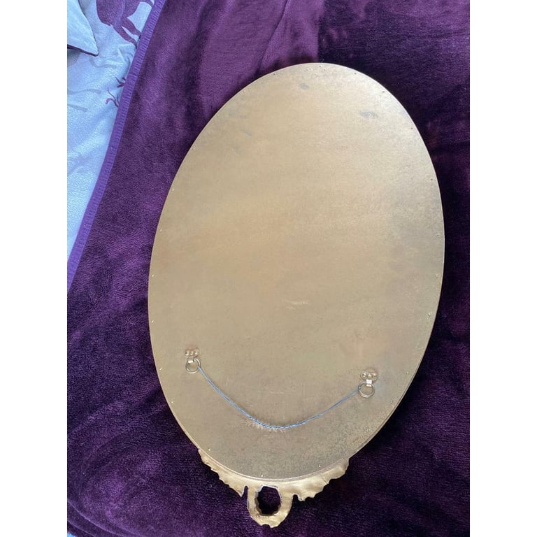 Vintage heavy bevelled oval mirror good condition 