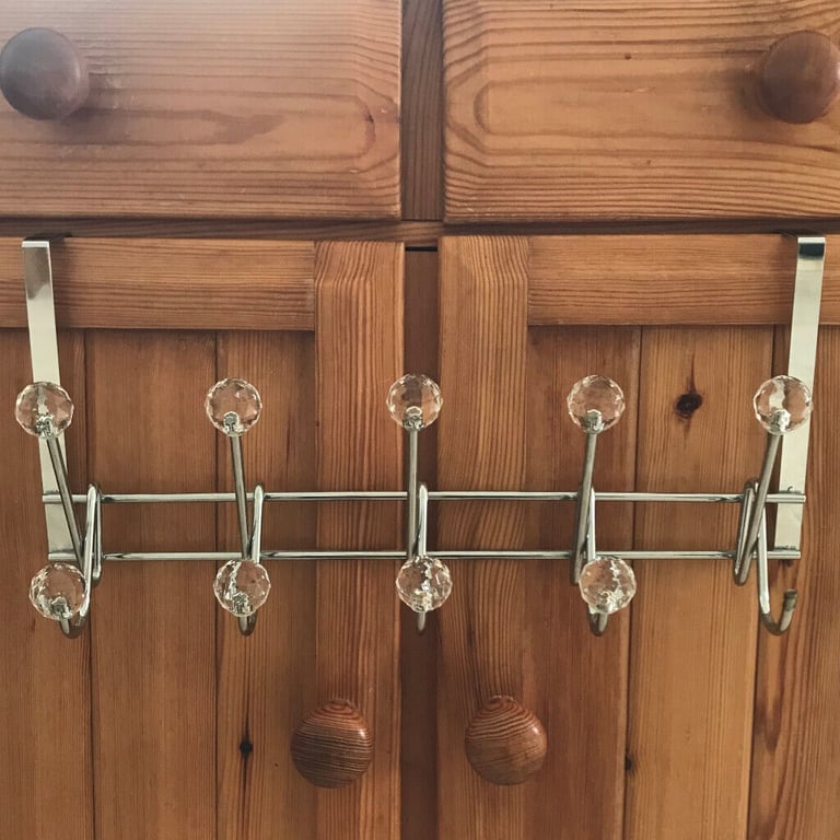 Jewelled over-door hooks - 10, chrome(d), multi-faceted glass effect finials, one missing. £4 ovno.