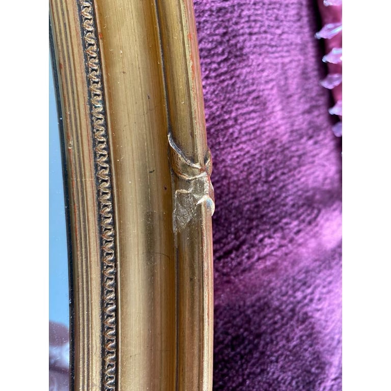 Vintage heavy bevelled oval mirror good condition 