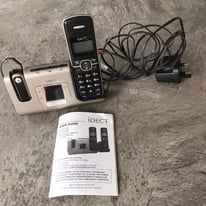Digital cordless telephone with answer machine and headset