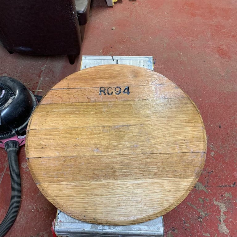 Revamped oak whisky barrel lid 0.600. wide 0.450 with metal legs to go no legs on yet. Can