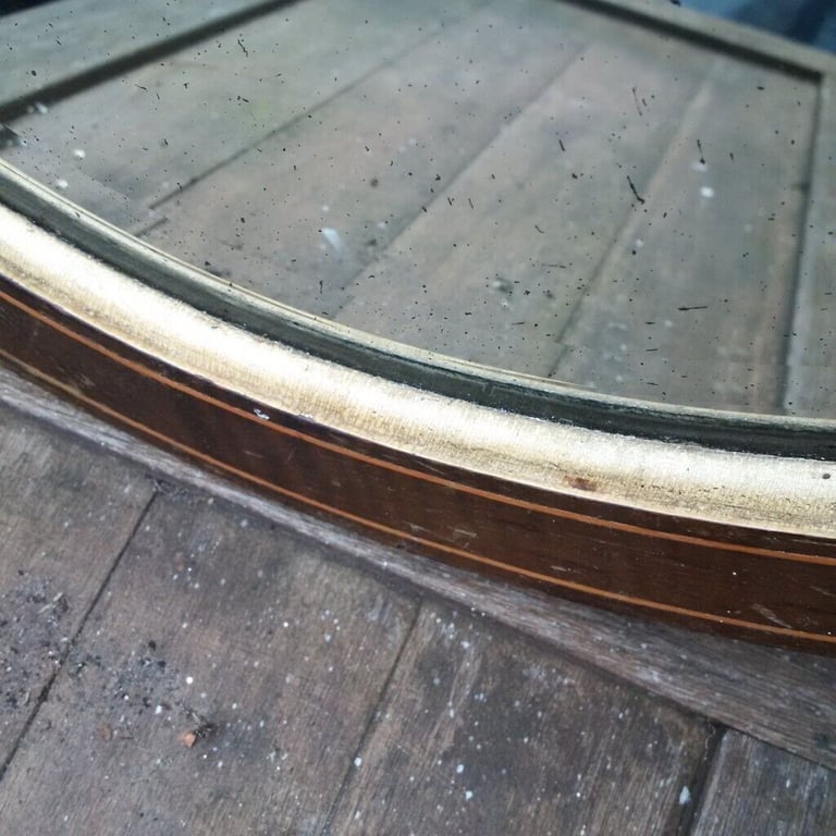 large vintage oval mirror in nice detailed wooden frame