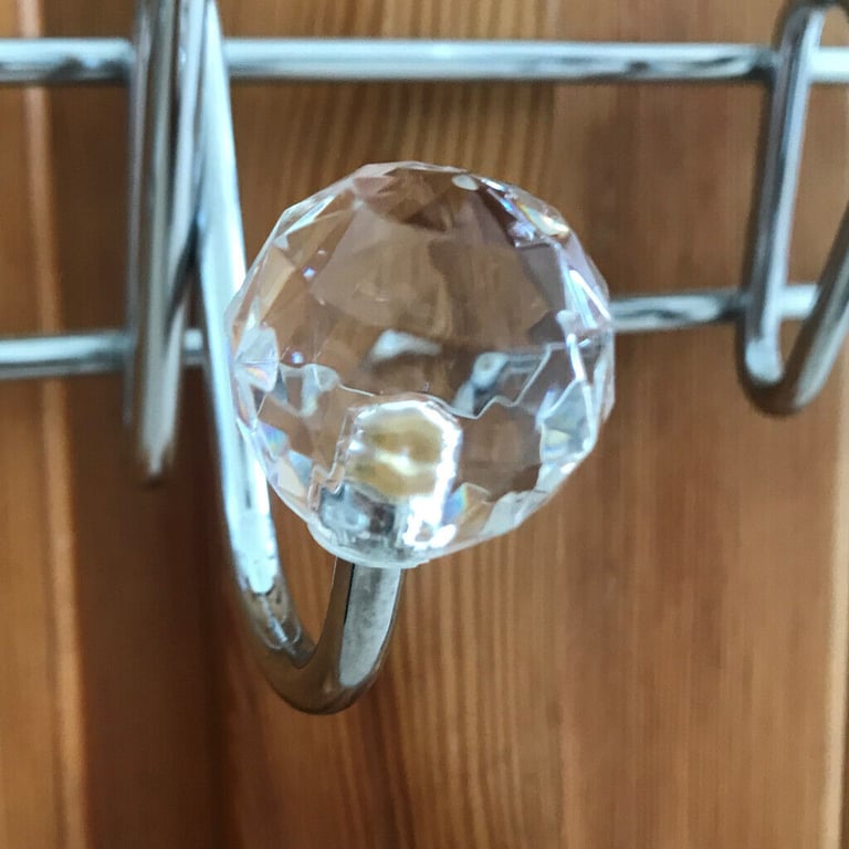 Jewelled over-door hooks - 10, chrome(d), multi-faceted glass effect finials, one missing. £4 ovno.