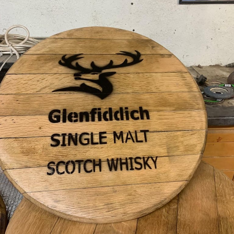 image for Revamped oak whisky barrel lid 0.600. wide 0.450 with metal legs to go no legs on yet. Can