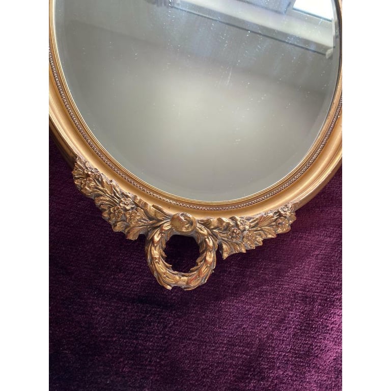 Vintage heavy bevelled oval mirror good condition 