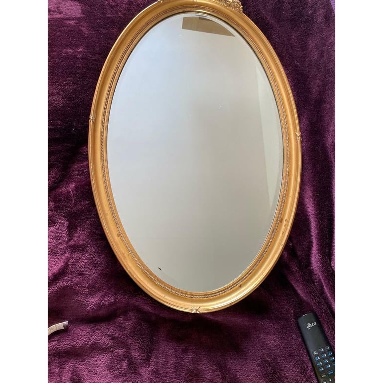 Vintage heavy bevelled oval mirror good condition 