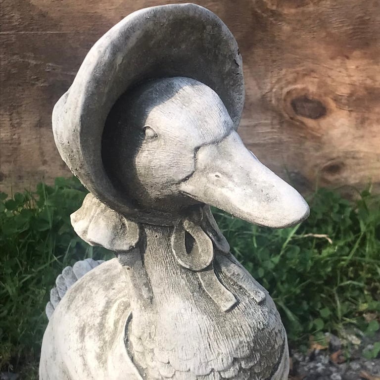 Sleeping puppy garden statue