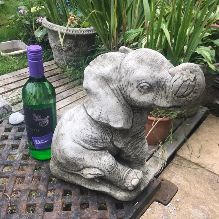 Sleeping puppy garden statue