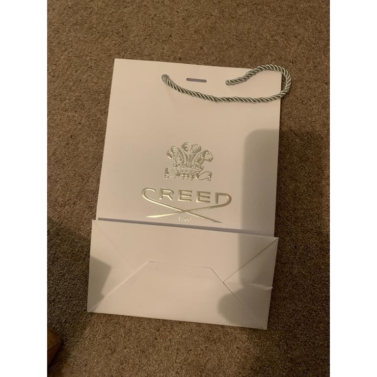  2 authentic Creed empty  bags & 1empty box 