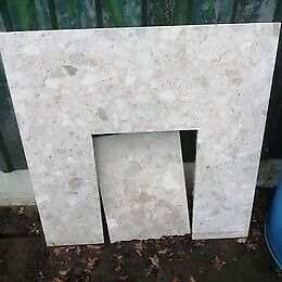 Marble style fire surround for re-use