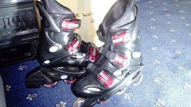 image for Inline boots one size 5 the other size 7