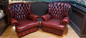 Fabulous pair of vintage Chesterfield ox blood wingback armchairs