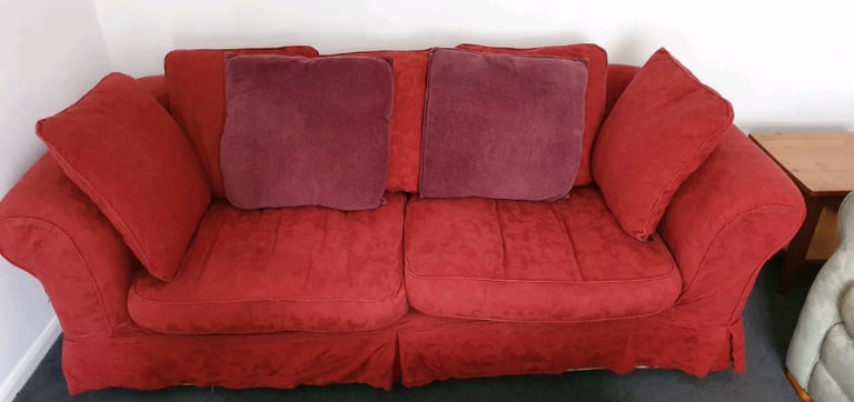 Long 3 seater sofa with removable washable covers .