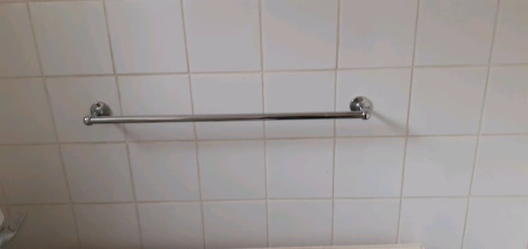 Chrome towel rail.