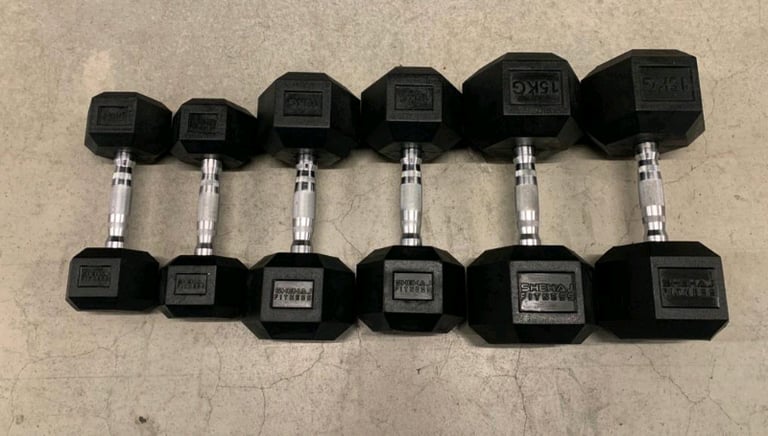 New- 2x15kg , 2x10kg and 2x5kg rubber hex dumbbells
