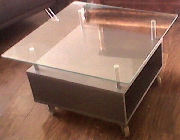 Coffee table on wheels, glass top (can deliver locally)