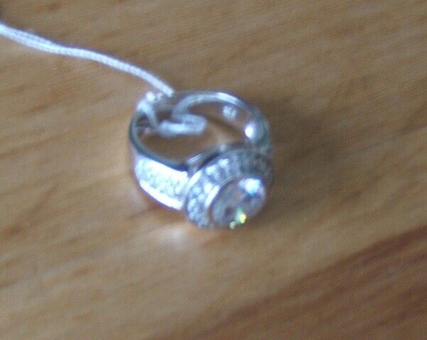 Brand New Rhodium Silver Ring Embedded with Round Shape Cubic Zirconia Size O .5 £79 RRP